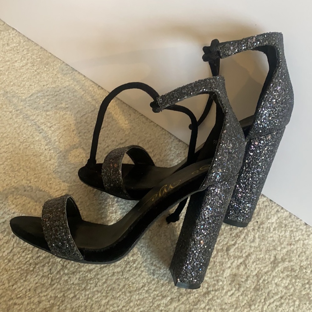 Black high heel sandals with velvet ties and shimmery trim